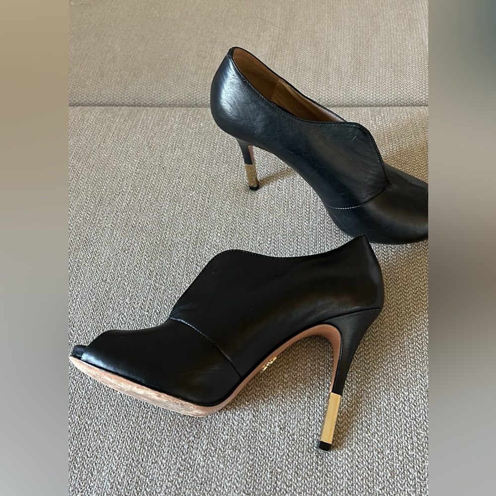 Black heels with accent cutout
